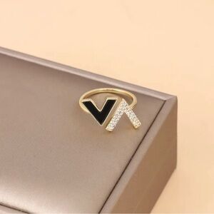 Elegant Black and Gold Ring